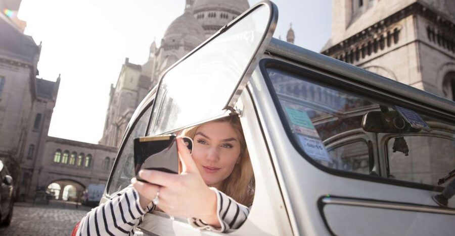 Classic, Romantic Paris: 3-Hour Vintage 2CV Tour - A vintage 2CV turns Paris traffic into part of the show