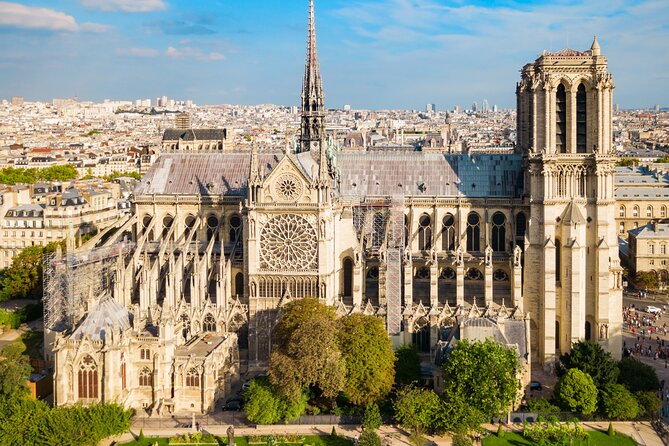 Early Access Paris Notre Dame Cathedral Walking Tour - Prefecture de Police exterior, WWII marks, and a reminder of modern history