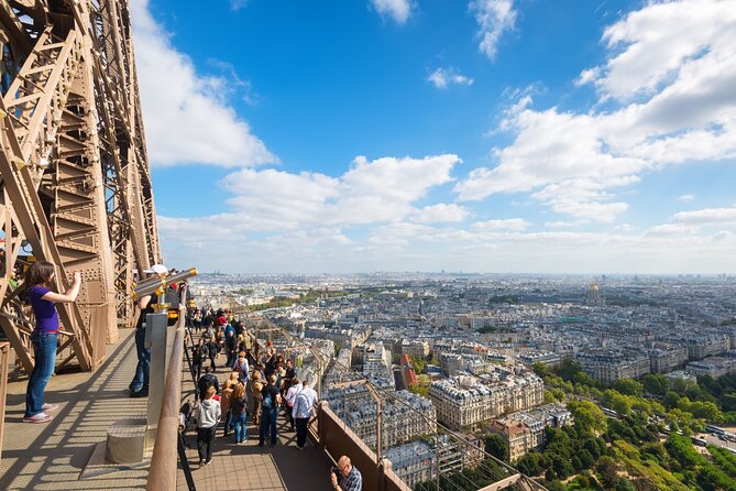 Eiffel Tower Reserved Access Summit or 2nd Floor Guided by Lift - Entering the Tower Flow: Escort to Security, Then Elevator to the 1st and 2nd Floors