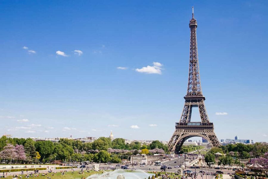 Eiffel Tower Reserved Access with Photoshoot stops - Meeting by the Seine, Then a Walk to Build Better Eiffel Views