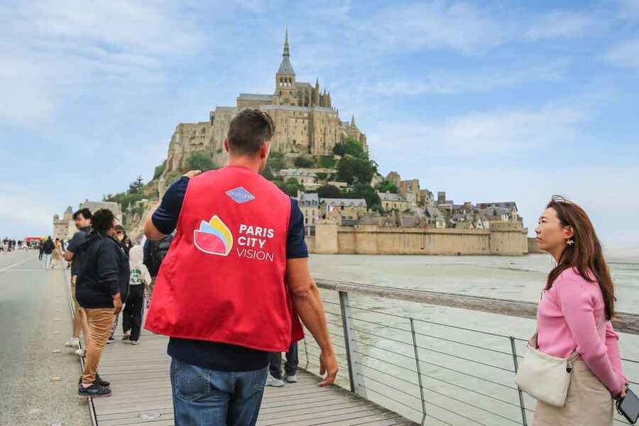 From Paris: Mont Saint-Michel Tour with Hotel Pickup Service - Passing Caen and the viewpoint stop on the way to the tidal island