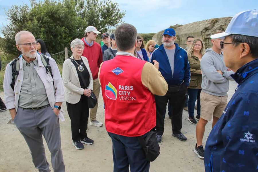 From Paris: Normandy D-Day Beaches Day Trip - Arromanches-les-Bains: lunch, Mulberry harbor remnants, and sea air