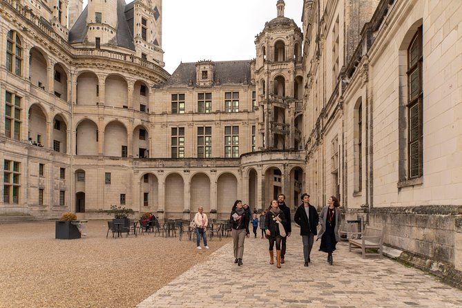 Loire Valley Castles Trip with Chenonceau and Chambord from Paris - Château de Cheverny: a family home with inventions, gardens, and dogs