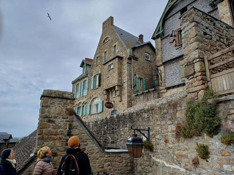 Mont Saint Michel: Village History and Legends Walking Tour - Meeting at the Tourist Information Center and crossing to the village