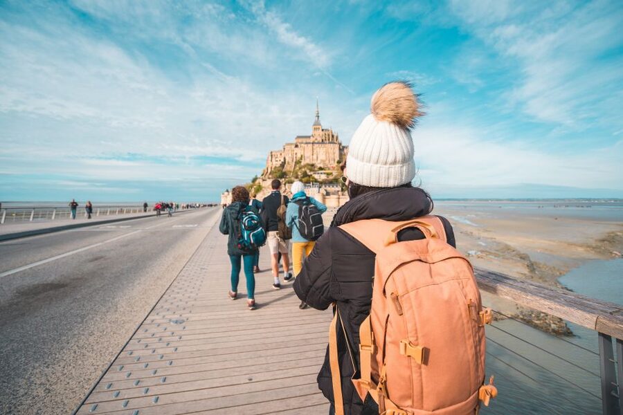 Mont Saint Michel: Walking Tour & Optional Abbey Ticket - Walking the village lanes toward the Abbey: cobblestones, icons, and the Grande Rue