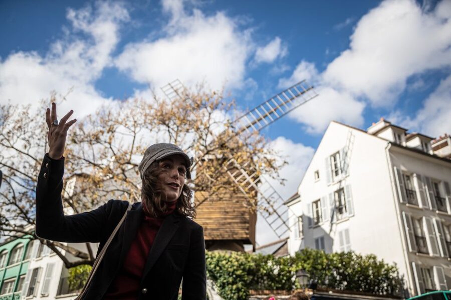 Montmartre en chansons: tour with a professional singer - Rue Lepic to Moulin de la Galette: where songs meet the Montmartre stage