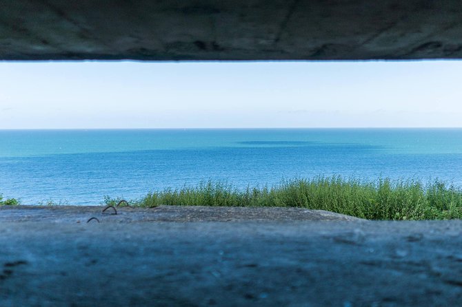 Normandy D-Day Small-Group Day Trip with Omaha Beach, Cemetery & Cider Tasting - Overlord Museum: tanks, a Higgins boat, and the bigger system behind D-Day