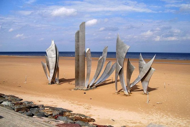 Omaha Beach D-Day Experience - Afternoon group tour from Bayeux - Getting to Pointe du Hoc: Rangers, Cliffs, and German Bunkers