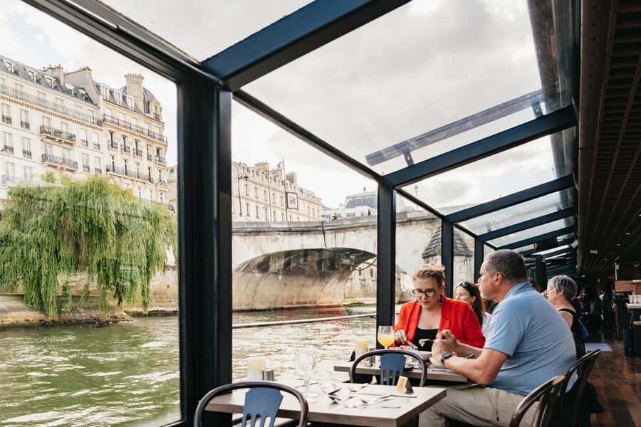 Paris : 3-Course Gourmet Dinner Cruise on Seine River - Champagne, coffee, and the live singing that sets the mood