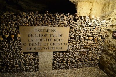 Catacombs Entry & Seine River Cruise with Audio Guide
