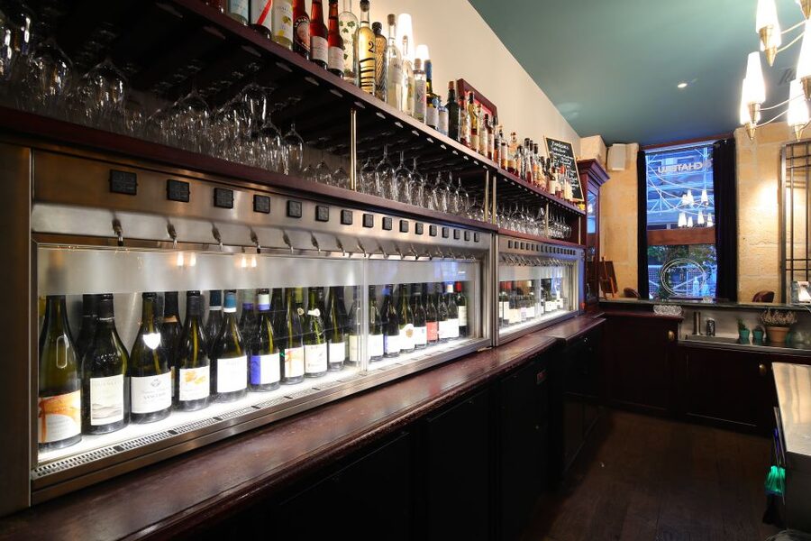Paris: Dinner with Customized Wine Selection - Entering O CHATEAU: Decor, Vibe, and the Wine Bar Centerpiece