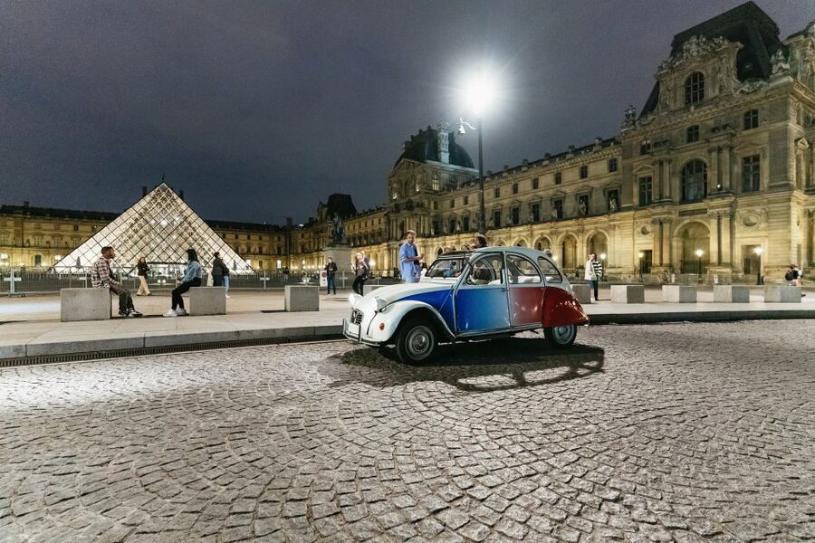 Paris: Discover Paris by Night in a Vintage Car with a Local - Louvre area to Notre Dame to Opera Garnier, the historic core in motion