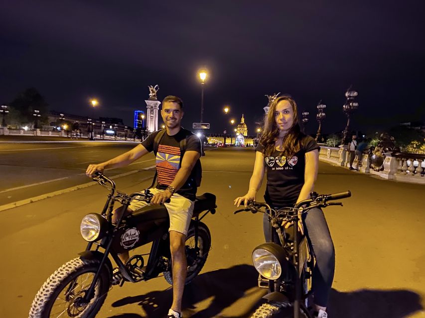 Paris: Eiffel Tower and Notre Dame Night Tour by E-Bike - Musée d’Orsay to the Orsay docks: train-station bones and riverside views