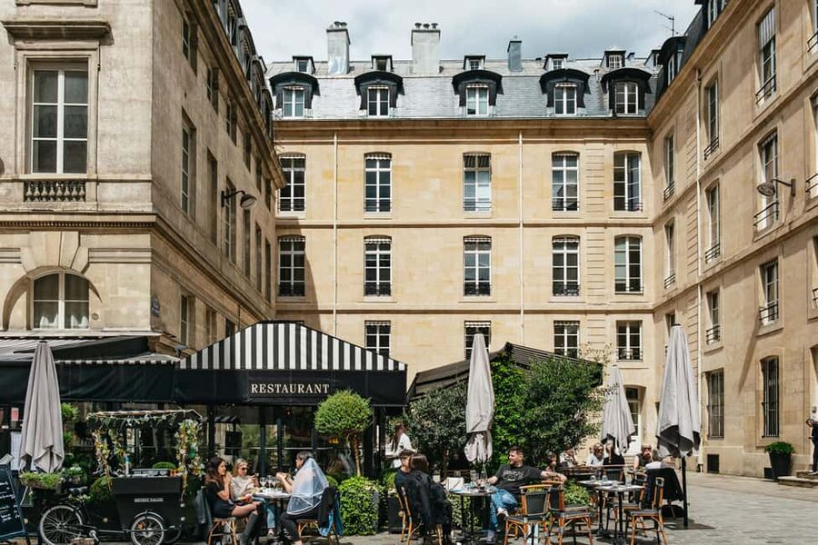 Paris: Emily TV Show Locations Guided Walking Tour - 8 Rue de Montpensier and Palais-Royal Garden: selfies, striped art, and Emily’s social moments