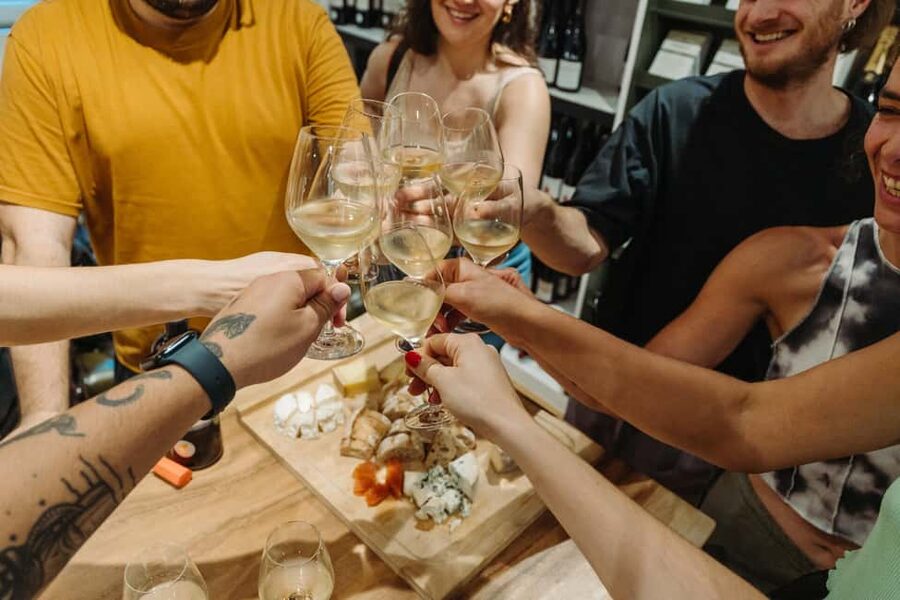 Paris: Food and Wine Tasting Walking Tour in Le Marais - The covered market stop and Moroccan crepes, street food with history