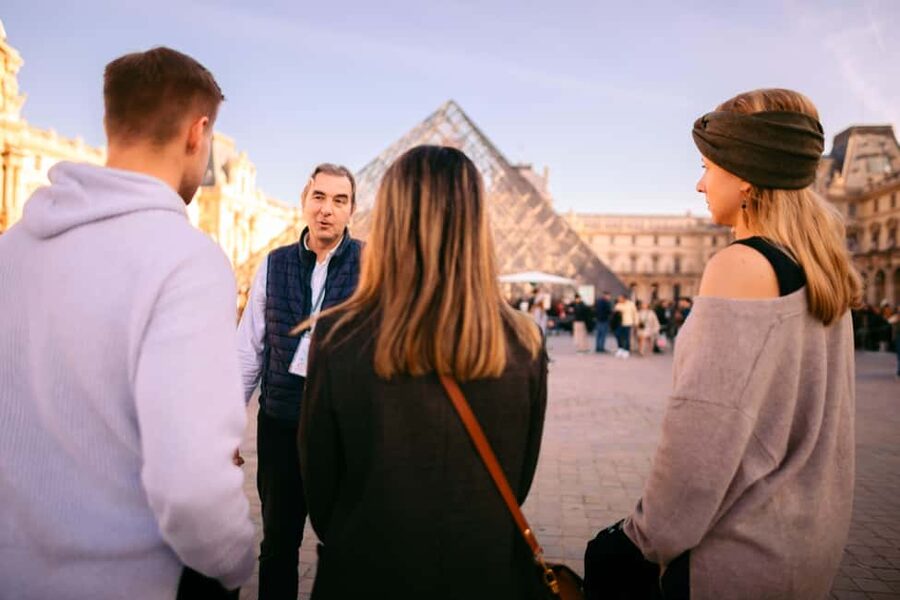 Paris Louvre Exclusive Semi Private Guided Tour Max 6 People - Meeting under the Louis XIV statue near the glass pyramid