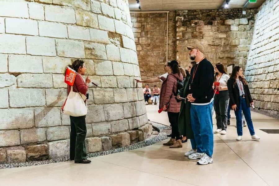 Paris: Louvre Museum and Orsay Museum Guided Tour - The Basement Stop, Foundations That Explain the Place