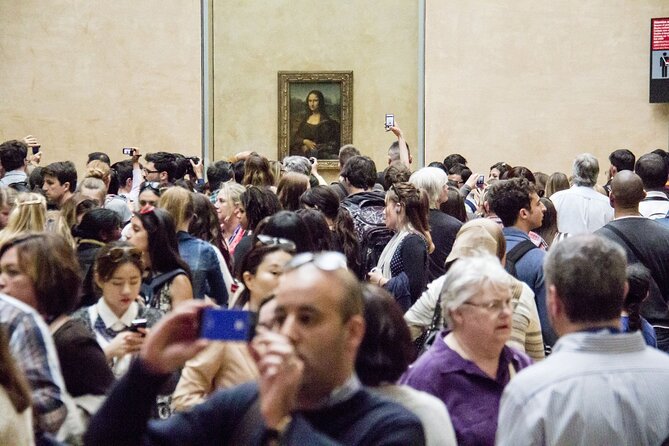 Paris: Louvre Museum Tour Mona Lisa & Iconic Masterpieces - The Louvre basement stop: castle foundations under the palace