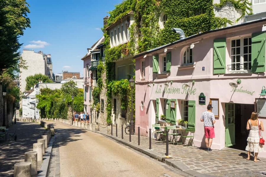 Paris Montmartre: 2-Hour City Tour in German - Meeting at Place Blanche, Starting Right by Moulin Rouge