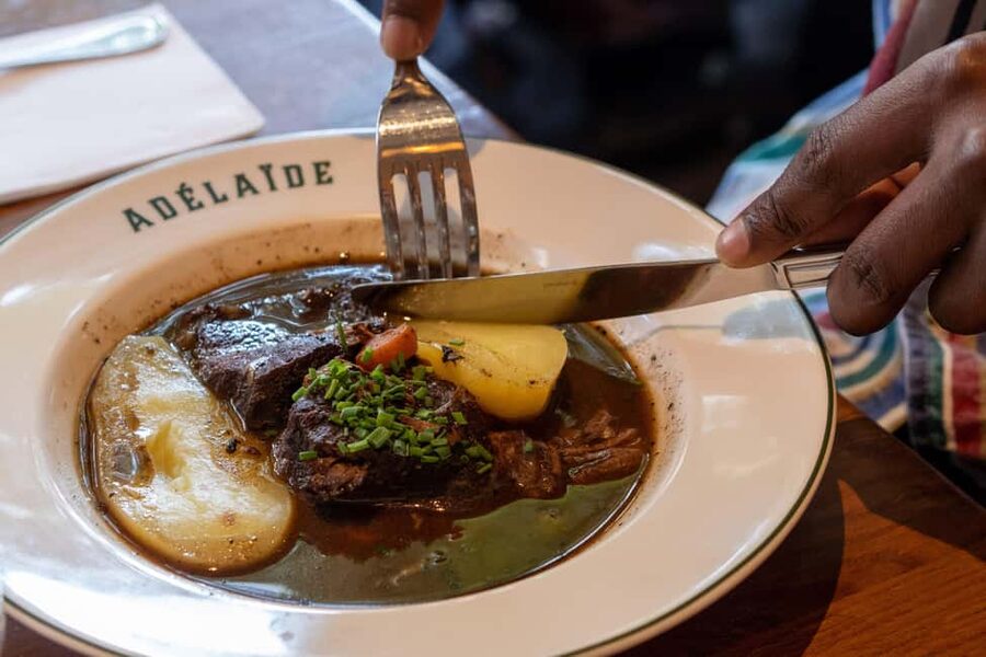 Paris: Montmartre Food Tour with Full Meal - Rue du Chevalier-de-La-Barre: when the food turns from cute to serious