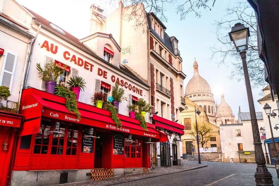 Paris: Montmartre Hidden Gems and Highlights Walking Tour - Meeting at Saint-Jean de Montmartre, Then Getting Oriented Fast