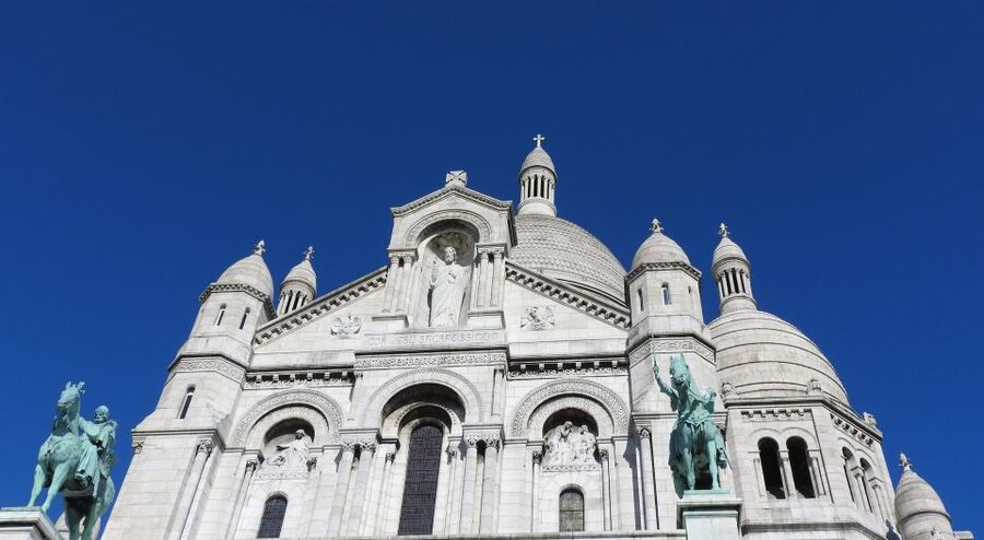 Paris: Sacré-Coeur and Montmartre Tour with Expert Guide - The walking reality: stairs, steep slopes, and who this tour suits