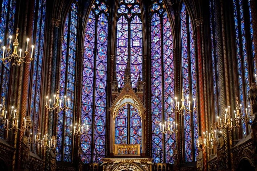 Paris: Sainte-Chapelle, Conciergerie, Notre Dame Guided Tour - Sainte-Chapelle: stained glass light and the 47-meter clock detail