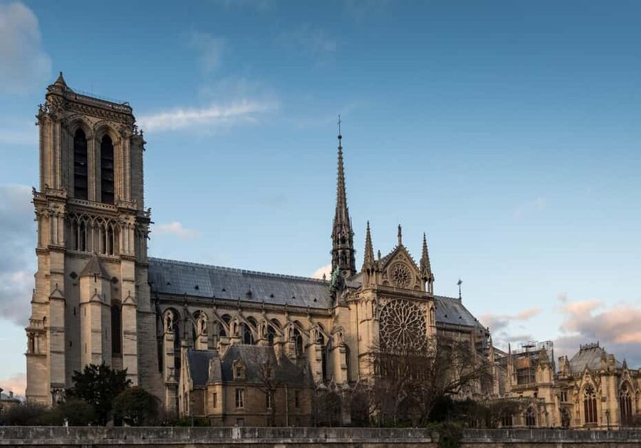 Paris: Sainte-Chapelle Entry with Notre Dame Outdoor Tour - Notre Dame from the outside, with restoration context after the 2019 fire