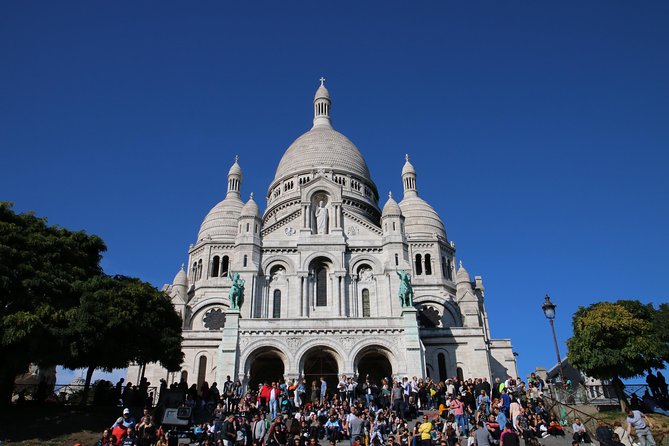 Paris Top Sights Half Day Walking Tour with a Fun Guide - Hotel de Ville, Arc de Triomphe, and the Louvre from the Street