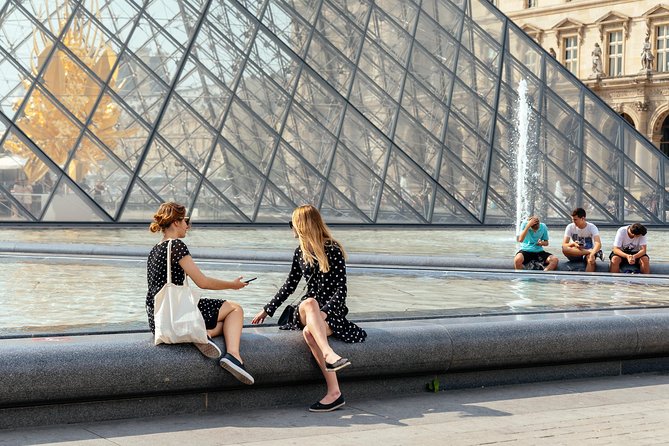 PRIVATE TOUR: Highlights & Hidden Gems of Paris With Locals - Palais Royal and Galerie Colbert: the Paris you want before the big crowds