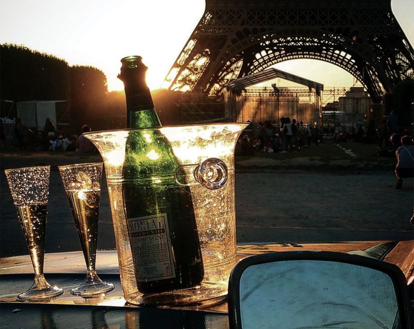 Private tour of Paris by Night with Champagne - Passing the Louvre, Notre Dame, and Opera Garnier Without the Crowds
