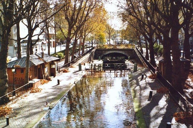 Seine River Cruise and Paris Canals Tour - Cruising the Seine: the icons you expect, seen with better context