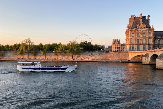 Seine River Evening Cruise with Music (Drink Options) - Pont Saint Michel, Île de la Cité, and Notre Dame from the water